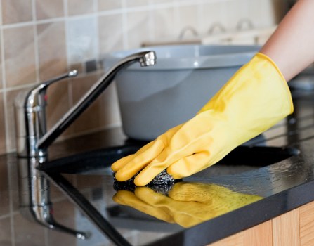 High-touch surfaces being cleaned in a modern office