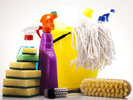Deep domestic cleaning supplies and checklist in a home setting